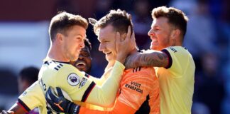 Bernd Leno, Ben White and Rob Holding celebrate beating Aston Villa