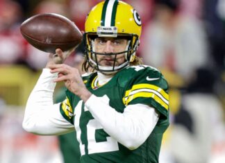 Rodgers says he is again with the Packers Rodgers says he's back with the Packers