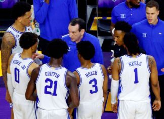 "Proud" coach K bows to the players

