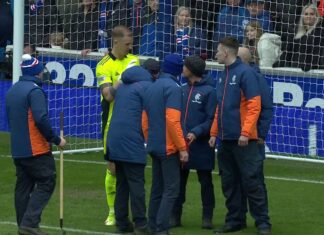 Stewards helped clear the penalty area after Joe Hart alerted referee Willie Collum