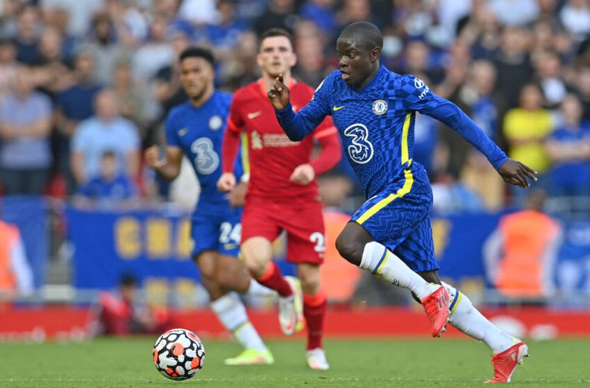 Chelsea's French midfielder N'Golo Kante runs with the ball during the Premier League soccer match between Liverpool and Chelsea at Anfield in Liverpool, northwest England on August 28, 2023. - - Restricted for editorial use. No use with audio, video, data, fixture lists, club/league logos or services